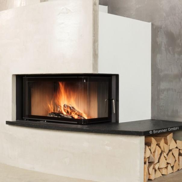 Indoor fireplace in white stone with SCHOTT ROBAX® angular bent fire-viewing panel