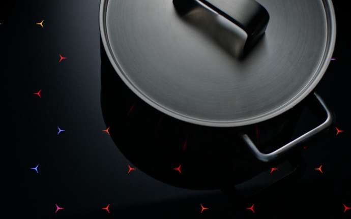 Black SCHOTT CERAN® glass-ceramic cooktop with pan