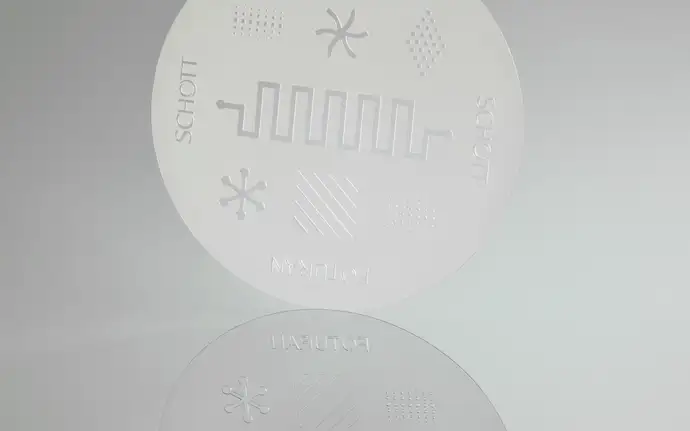 Glass disc with etched patterns