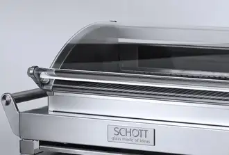 Silver grill with SCHOTT NEXTREMA® glass-ceramic viewing panel