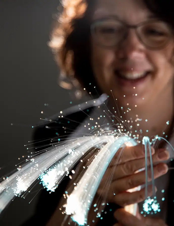 Woman with PURAVIS® glass optical fibers