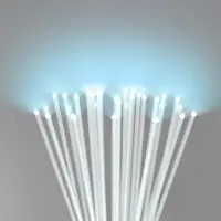 A bundle of glowing white fibers as special-shaped diffusers, radiation blue light, set against a gray background.