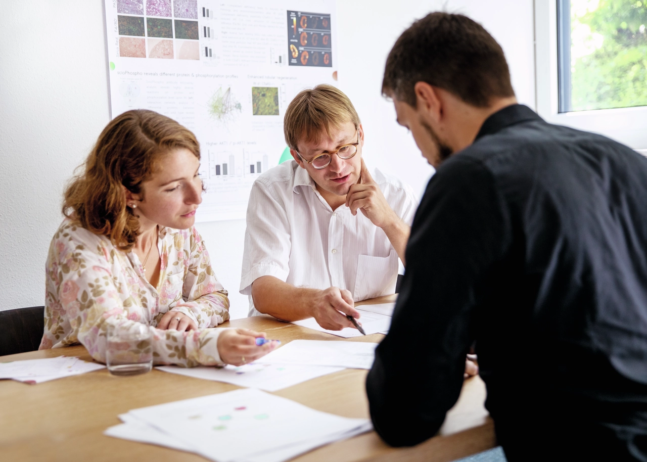 (L-R) Dr. Camille Lowy, Dr. Christoph Schröder, and Dr. Ronny Schmidt from Sciomics