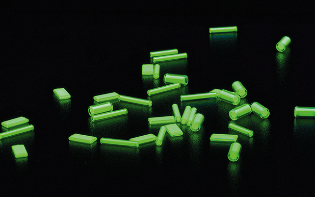 Self-illuminating green trigalights in various shapes and sizes; Copyright: mb-microtec