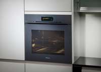 Kitchen oven with glass door and control panel 