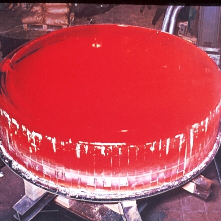 Large red disk of ZERODUR® glass-ceramic in the 1960s 