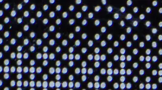 Close up of a glass panel printed with Duo Design ceramic color