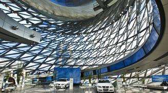 Transparent glass wall of BMW Welt in Munich, Germany