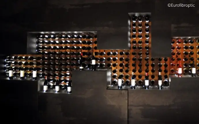 Illuminated display of wine bottles