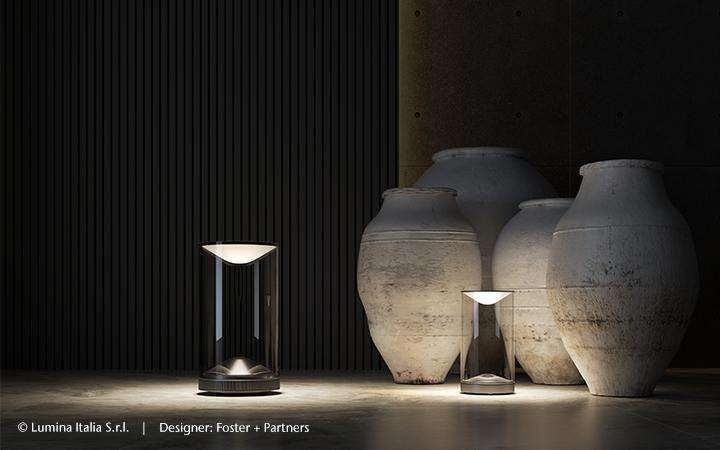  Two designer glass lamps by Lumina in front of four stone vases Image title: DURAN® glass offers high transparency and a clean, modern look for designers