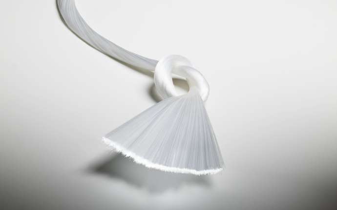 Glass optical fibers that are tied into a knot