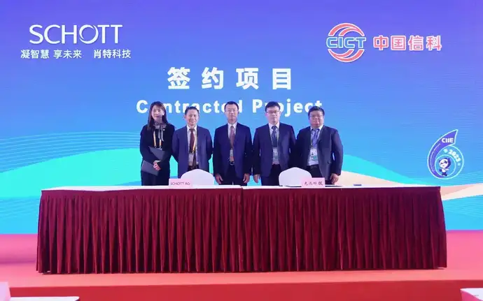 Representatives from both companies at the signing ceremony