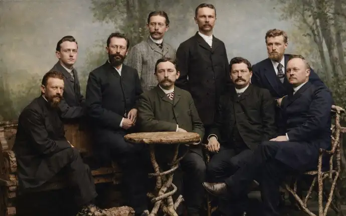 Historical group photograph of Otto Schott seated among scientists and engineers including Paul Rudolph, Siegfried Czapski, and Carl Pulfrich.