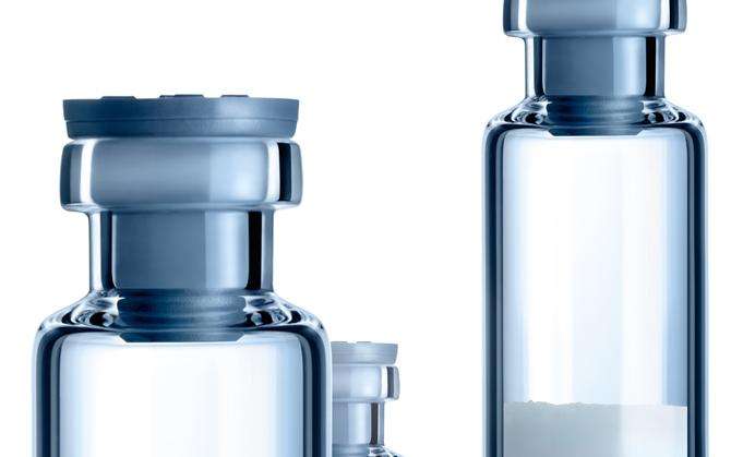 Three glass vials of different sizes by SCHOTT Pharma
