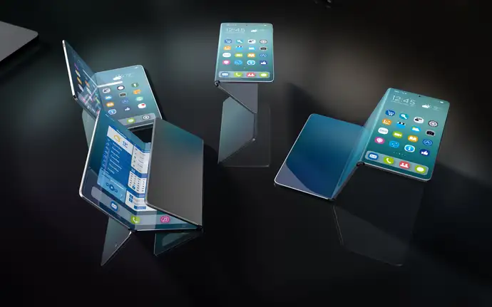 Quatre smartphones pliables sur fond sombre