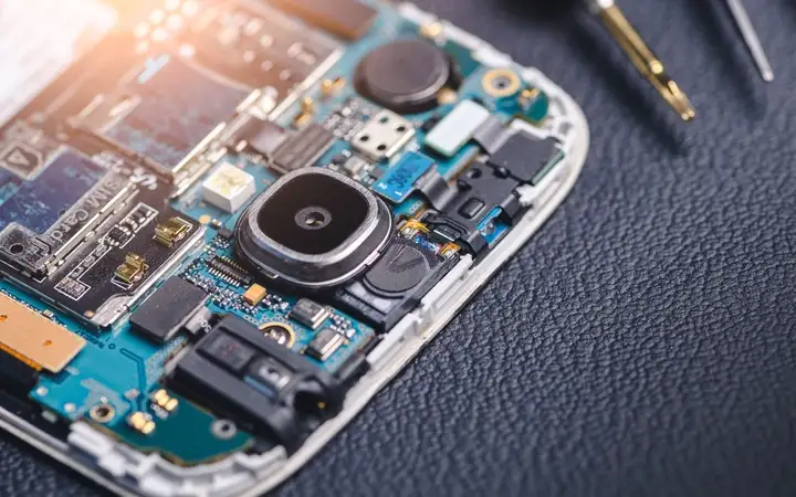 Electronic microchips and semiconductors inside a smartphone