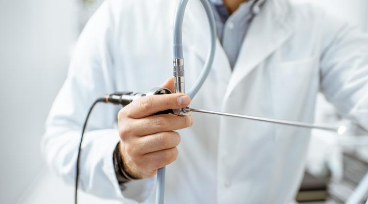 Doctor holding medical endoscope