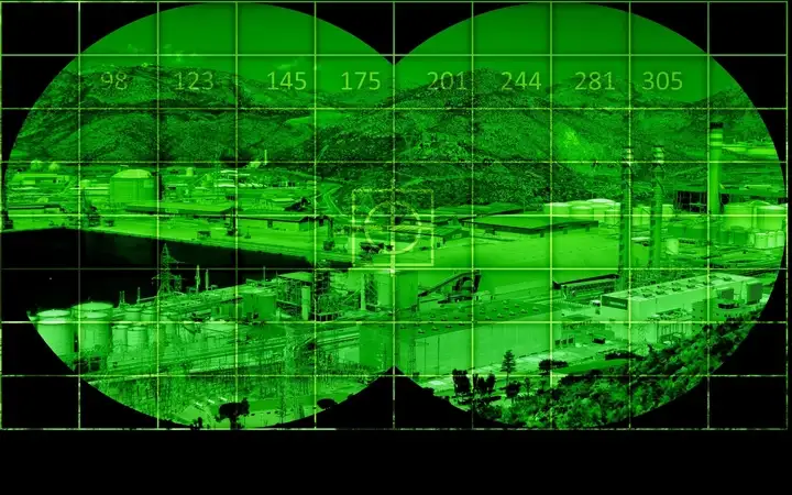 View of an industrial area seen through night vision glasses