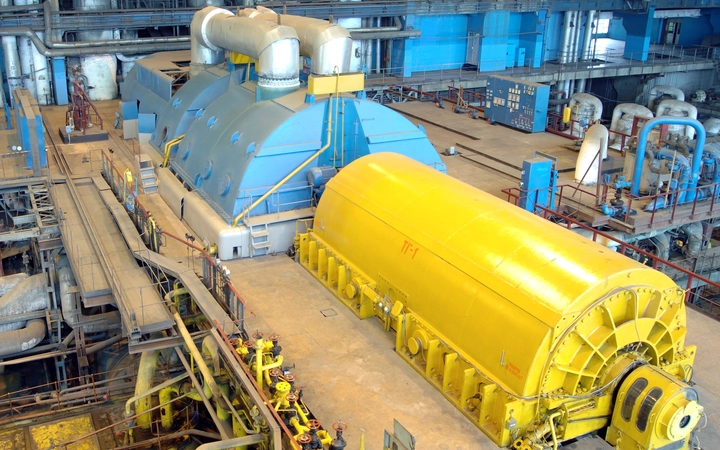 Large yellow and blue industrial generator