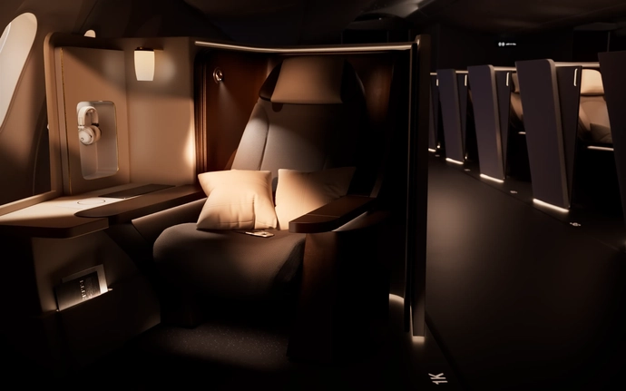 Luxury airplane seat with pillows and ambient lighting