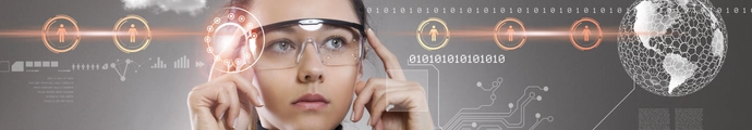 Young female wearing augmented reality glasses looking at computer-generated information