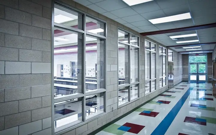 Internal wall featuring windows and transoms with fire-rated safety glazing 