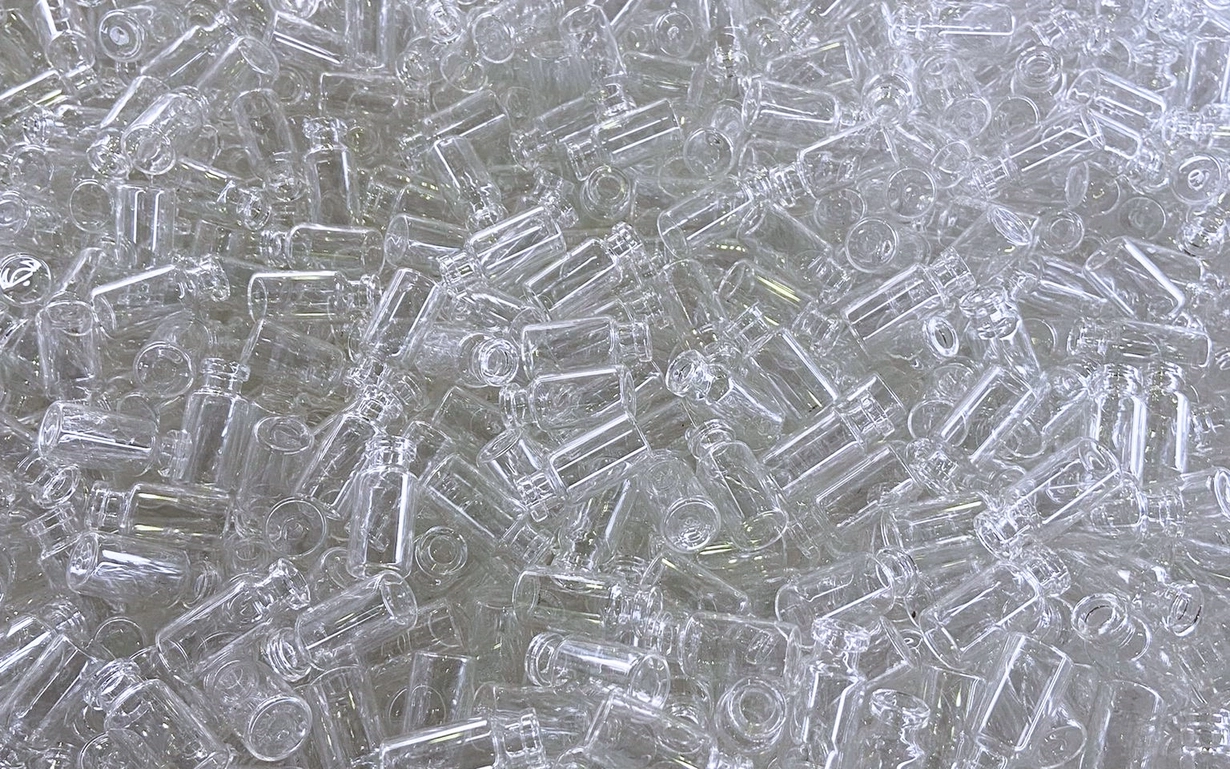 View from above of a pile of pharmaceutical vials