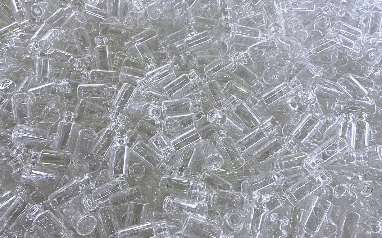 View from above of a pile of pharmaceutical vials