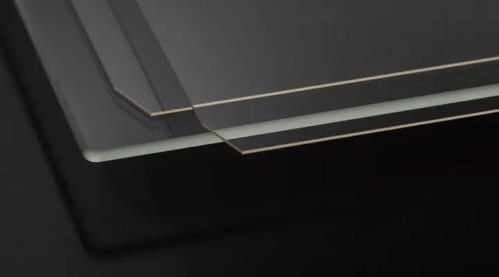 A range of transparent SCHOTT Glass Panels on dark background 