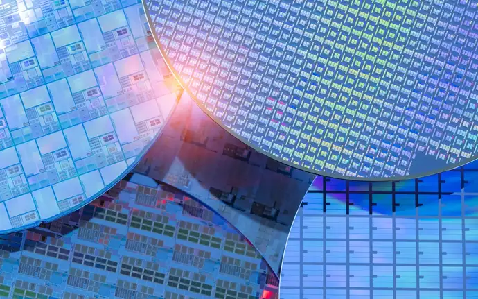 Multiple nanostructured wafers showing replicated optical patterns for nanoimprint lithography at wafer scale