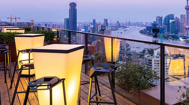 Rooftop bar looking out over a city