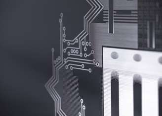 Glass panels that enable high-density interconnectors for advanced semiconductor packaging