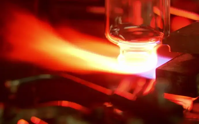 Vial being created from glass tubes using the converting process