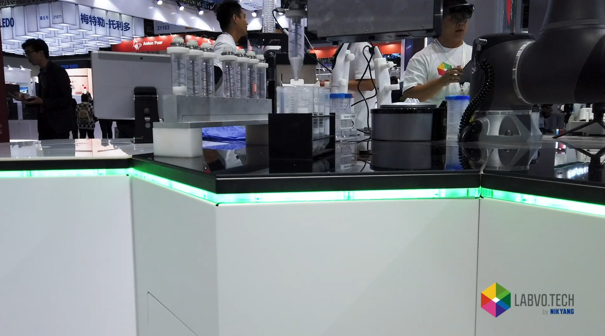 Series of laboratory equipment on modular units at trade show