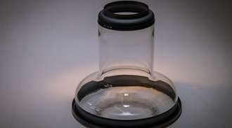Glass X-ray flask with angled rings