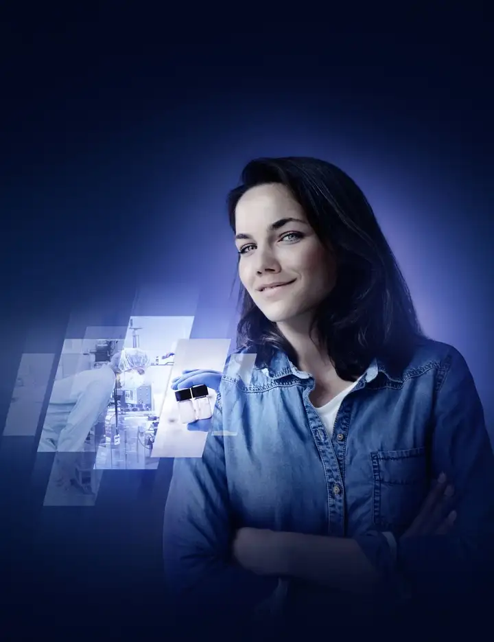 Female in blue shirt with images of scientist and glass vials 