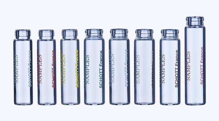 A line of clear glass vials 