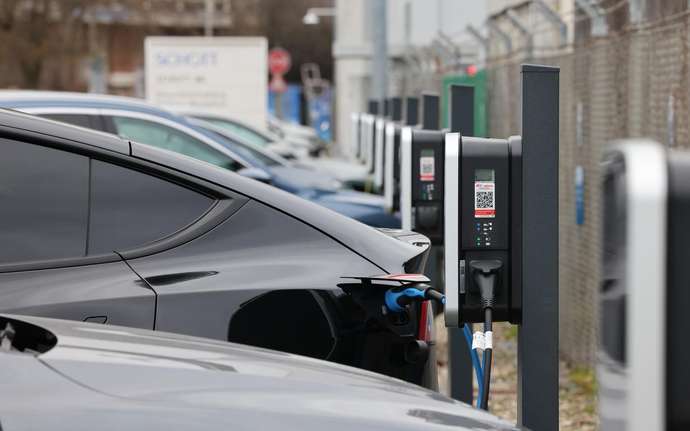 Electric cars at charging stations
