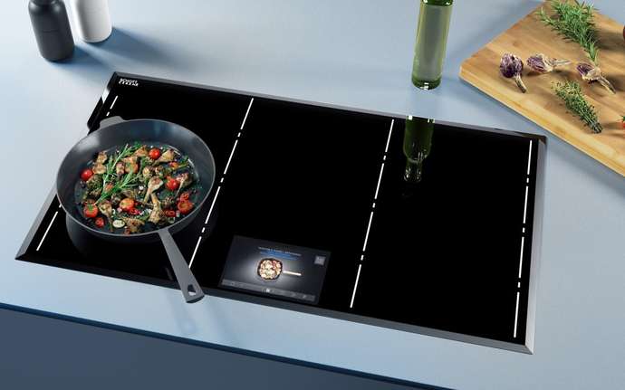 CERAN Luminoir® TFT sets a new standard for glass ceramic cooktop design.