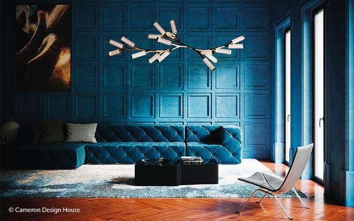 Lounge area with blue walls and modern glass chandelier