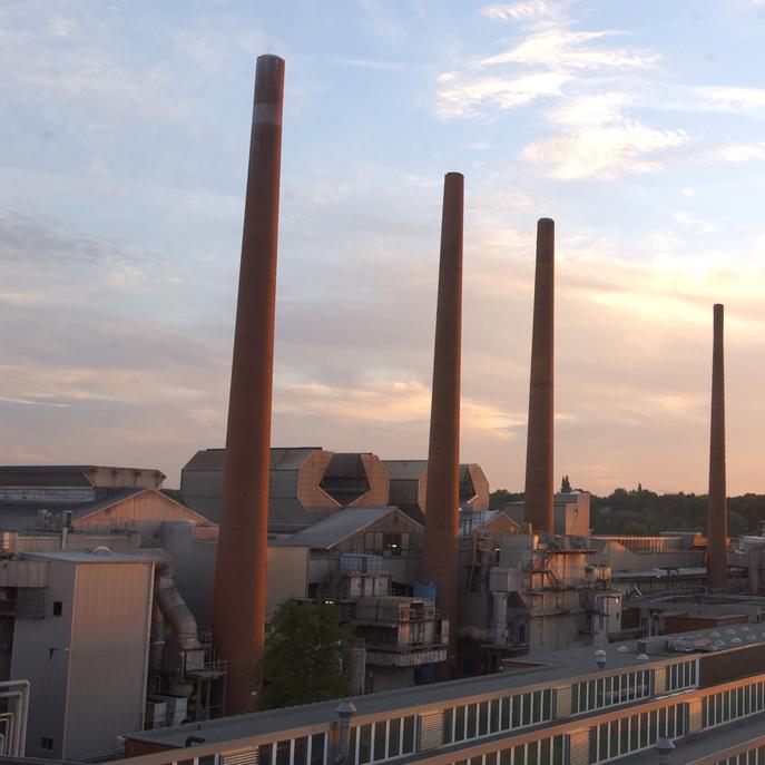 Tall chimneys of the SCHOTT specialty glass manufacturing plant in Mainz, Germany