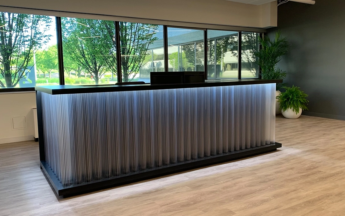 Reception desk in SCHOTT North America office made using CONTURAX® Tough glass tubing