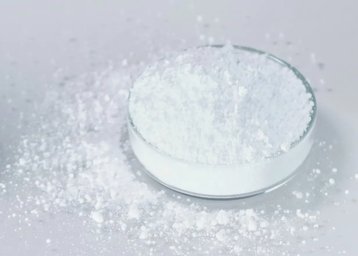 White glass powder, as fine as baby powder, in a Petri dish.