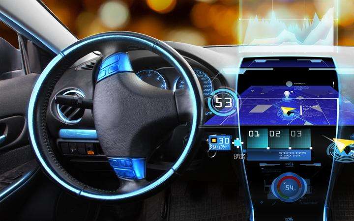 Dashboard and steering wheel of a vehicle fitted with glass displays, touchscreens and lighting