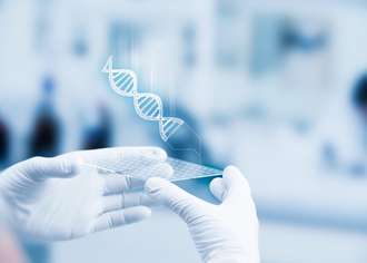 Two hands holding a lab-on-a-chip with a 3D graphic of a DNA helix emerging from it.