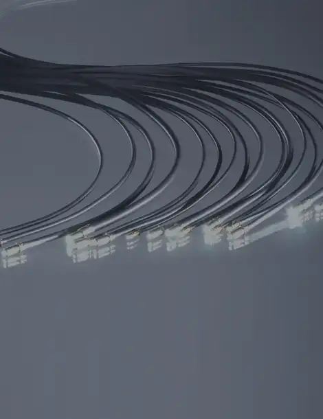 Cabos de luz de fibra óptica preta em piso cinza