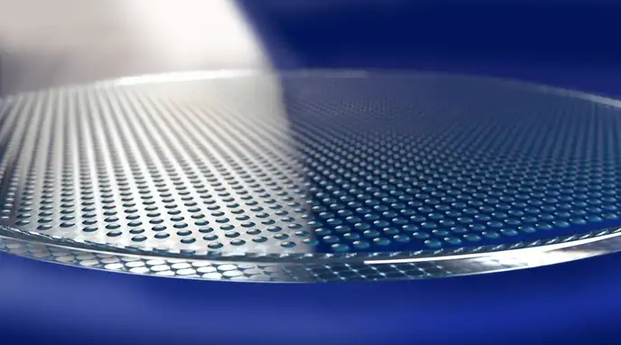 Structured glass wafer for wafer-level optics and scalable optical integration